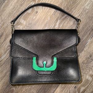 Coccinelle- Women's leather handbag. Excellent condition.